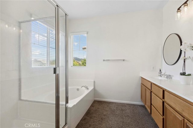33184 Puffin St, Temecula, CA 92592 - bathroom with double vanity, a shower stall, a bath, and baseboards