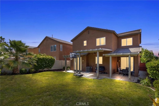 33184 Puffin St, Temecula, CA 92592 - back of property featuring a pergola, a patio, cooling unit, and stucco siding