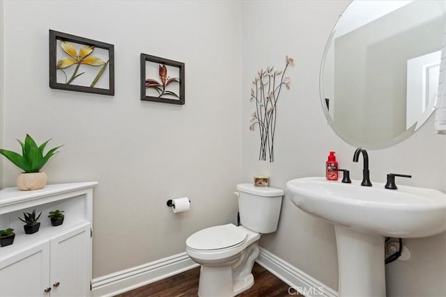 11313 Atlas Ct, Corona, CA 92883 - bathroom featuring baseboards and wood finished floors