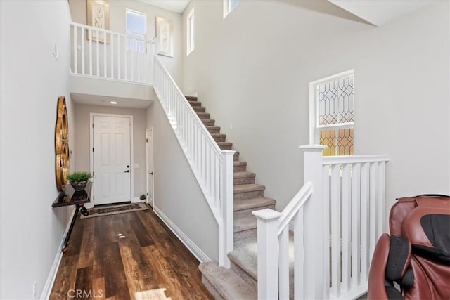 11313 Atlas Ct, Corona, CA 92883 - stairs with wood finished floors and a towering ceiling
