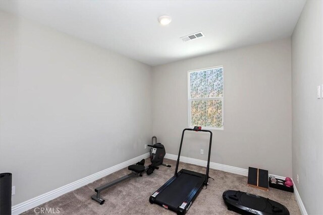 11313 Atlas Ct, Corona, CA 92883 - workout room featuring carpet and baseboards