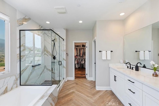11313 Atlas Ct, Corona, CA 92883 - full bath with vanity, a marble finish shower, a bath, a spacious closet, and recessed lighting