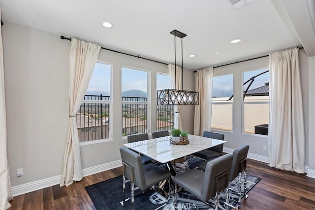 11313 Atlas Ct, Corona, CA 92883 - dining area with dark wood-style flooring, healthy amount of natural light, and recessed lighting