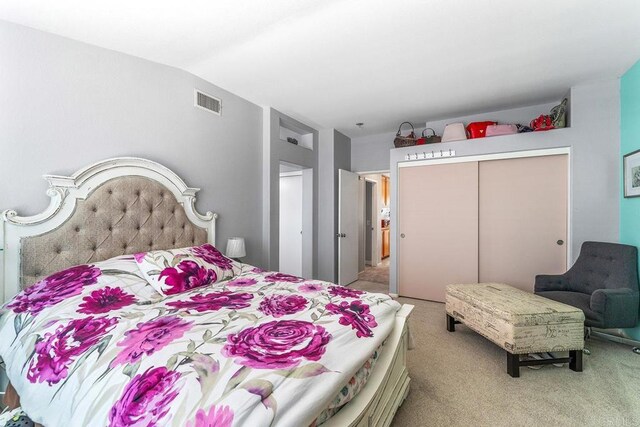 4610 Los Alamos Way Unit C, Oceanside, CA 92057 - bedroom with light carpet and a closet
