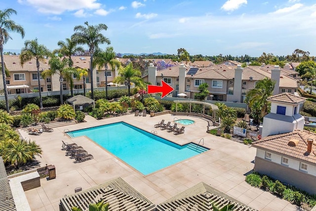 4610 Los Alamos Way Unit C, Oceanside, CA 92057 - community pool featuring a residential view, a patio, and a hot tub