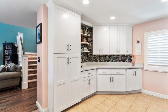 4610 Los Alamos Way Unit C, Oceanside, CA 92057 - bar featuring backsplash, stairs, baseboards, recessed lighting, and light tile patterned floors