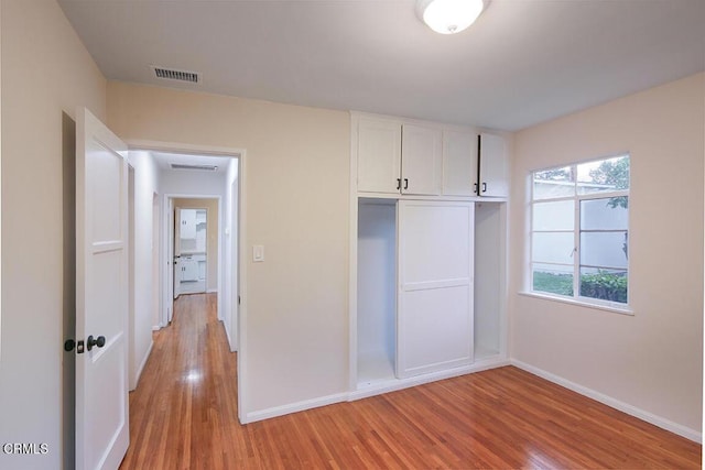 139 Spanner St, Monrovia, CA 91016 - unfurnished bedroom featuring baseboards, light wood-style flooring, and a closet