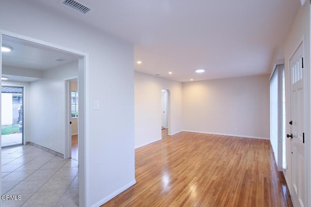 139 Spanner St, Monrovia, CA 91016 - spare room featuring baseboards, recessed lighting, light wood-style flooring, and arched walkways