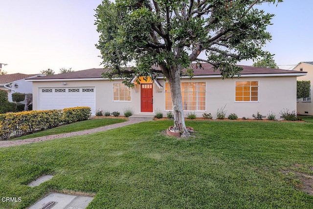 139 Spanner St, Monrovia, CA 91016 - single story home with stucco siding, a front lawn, and a garage