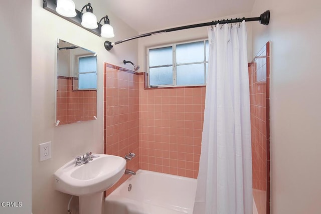 139 Spanner St, Monrovia, CA 91016 - bathroom featuring shower / bath combination with curtain and a sink