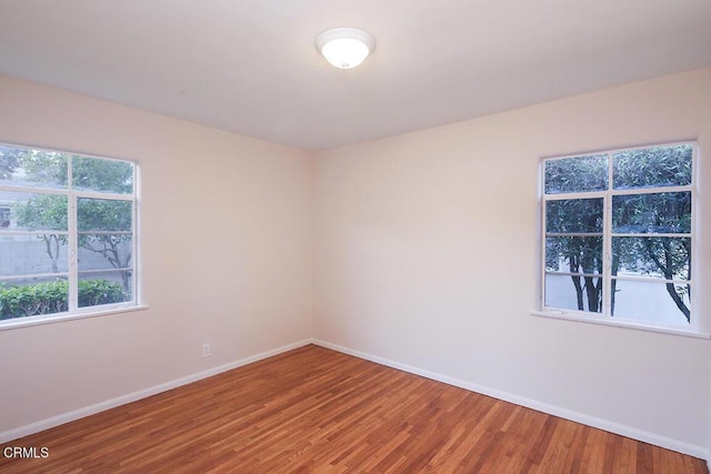 139 Spanner St, Monrovia, CA 91016 - empty room with baseboards and wood finished floors