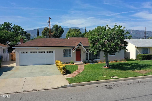 139 Spanner St, Monrovia, CA 91016 - ranch-style home with driveway, stucco siding, a mountain view, an attached garage, and a front yard