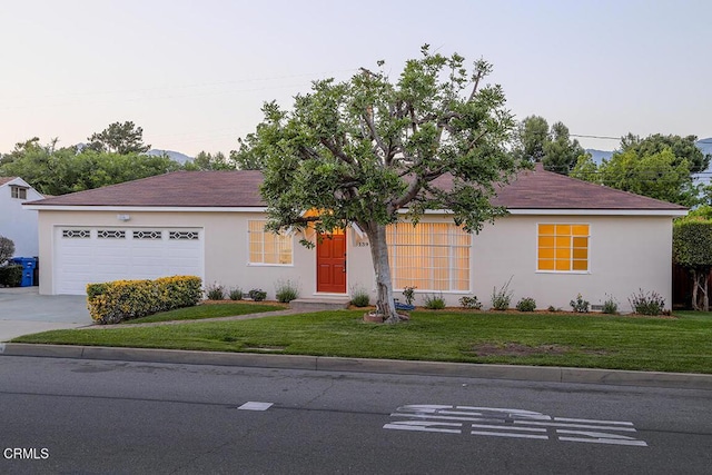 139 Spanner St, Monrovia, CA 91016 - single story home featuring driveway, a front yard, stucco siding, and a garage