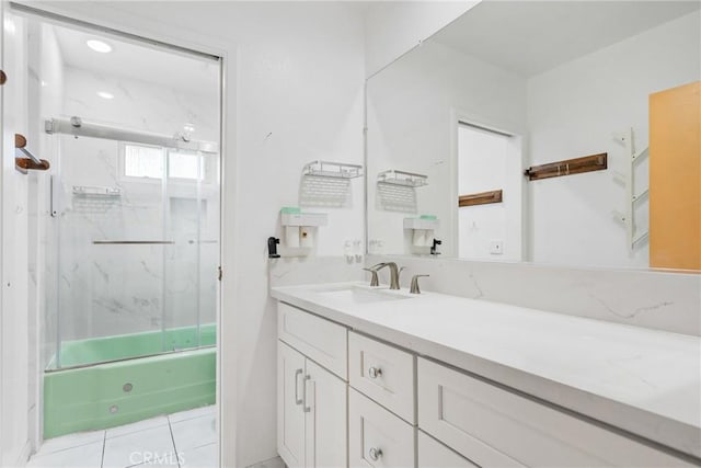 344 E Reed St, Covina, CA 91723 - bathroom featuring vanity, enclosed tub / shower combo, and tile patterned flooring