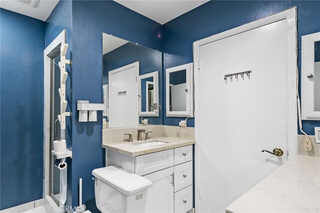 344 E Reed St, Covina, CA 91723 - full bathroom with vanity, toilet, and a shower stall