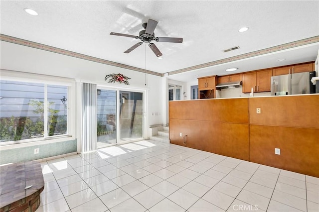344 E Reed St, Covina, CA 91723 - unfurnished living room with ceiling fan, recessed lighting, and light tile patterned floors