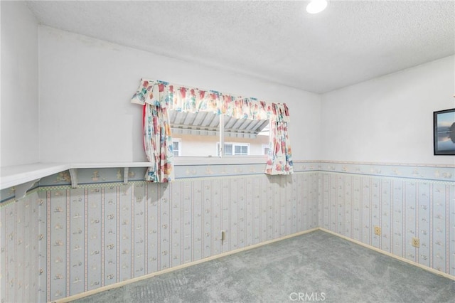344 E Reed St, Covina, CA 91723 - carpeted spare room featuring a textured ceiling and wallpapered walls