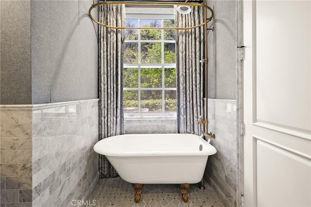 755 Carriage House Dr, Arcadia, CA 91006 - bathroom featuring healthy amount of natural light, a freestanding tub, wainscoting, and tile walls