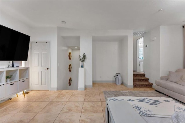 31210 Strawberry Tree Ln Unit 52, Temecula, CA 92592 - living room with stairway and light tile patterned floors
