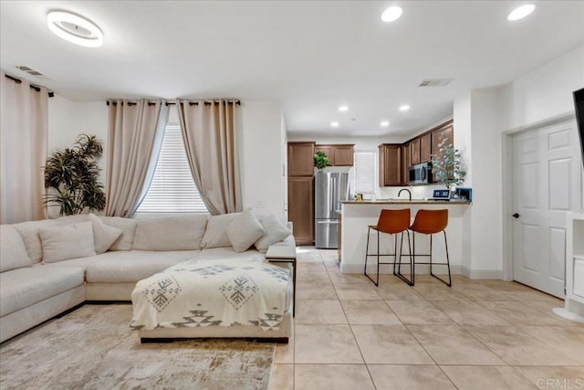 31210 Strawberry Tree Ln Unit 52, Temecula, CA 92592 - living area with recessed lighting, light tile patterned flooring, and baseboards