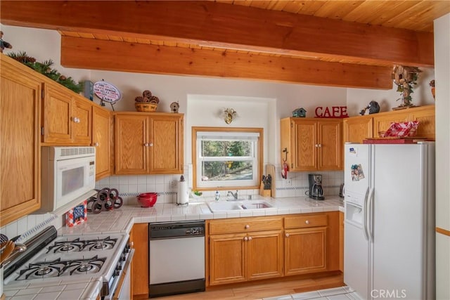 1176 Aleutian Dr, Lake Arrowhead, CA 92352 - kitchen with white appliances, backsplash, a wood ceiling with exposed beams, and tile countertops