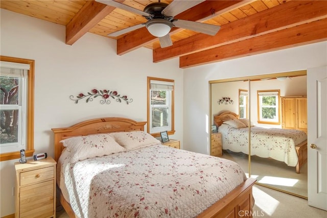 1176 Aleutian Dr, Lake Arrowhead, CA 92352 - bedroom with light colored carpet, a closet, a wood ceiling with exposed beams, and a ceiling fan
