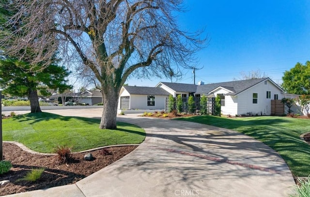 13081 Fairmont Way, Tustin, CA 92705 - single story home featuring a front yard and curved driveway