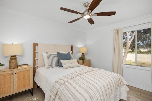 25611 Quail Run Unit 18, Dana Point, CA 92629 - bedroom with wood finished floors, crown molding, baseboards, and a ceiling fan
