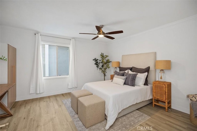25611 Quail Run Unit 18, Dana Point, CA 92629 - bedroom with light wood-type flooring, ornamental molding, ceiling fan, and baseboards