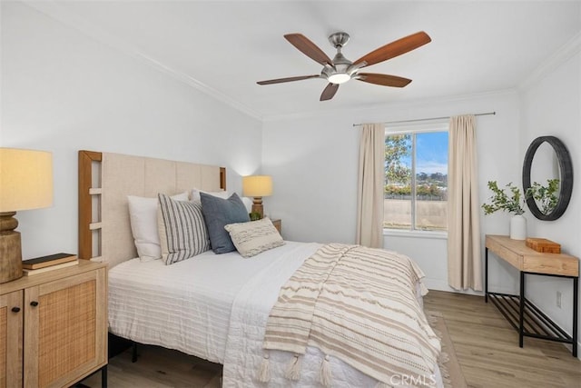 25611 Quail Run Unit 18, Dana Point, CA 92629 - bedroom with ornamental molding, wood finished floors, and a ceiling fan