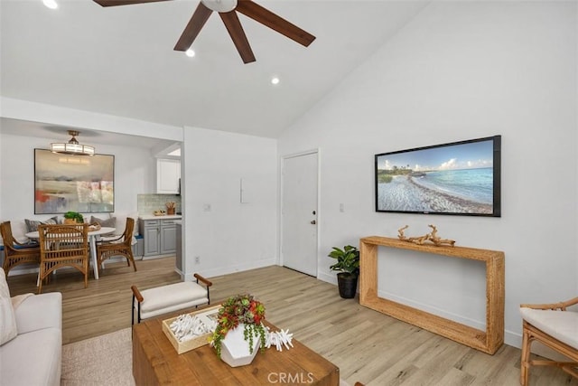 25611 Quail Run Unit 18, Dana Point, CA 92629 - living area featuring a ceiling fan, high vaulted ceiling, light wood finished floors, recessed lighting, and baseboards