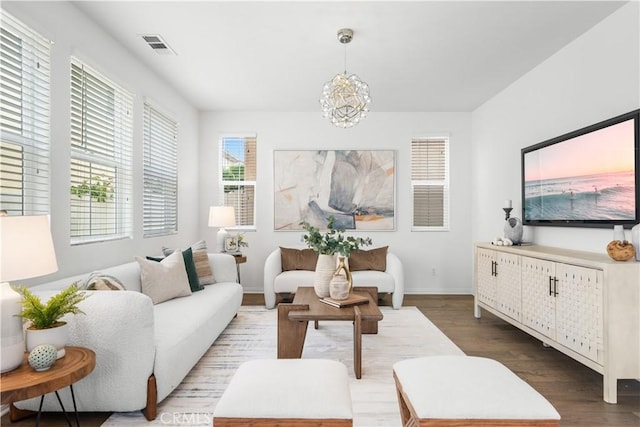 333 Calle Elegante, Lake Forest, CA 92630 - living area featuring wood finished floors, a chandelier, and baseboards