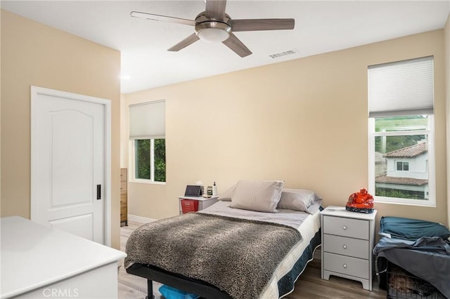38 Tessera Ave, Lake Forest, CA 92610 - bedroom featuring wood finished floors, ceiling fan, and baseboards