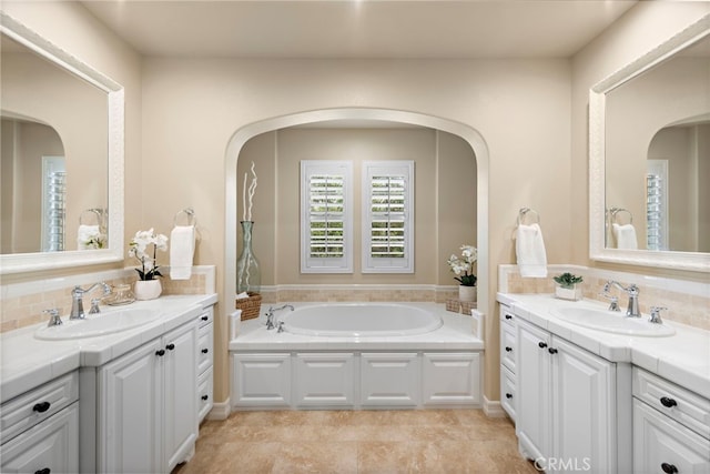 21 Corte Lomas Verdes, San Clemente, CA 92673 - bathroom with two vanities, decorative backsplash, and a garden tub