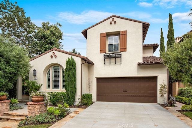 21 Corte Lomas Verdes, San Clemente, CA 92673 - mediterranean / spanish-style house with a tile roof, a garage, concrete driveway, and stucco siding