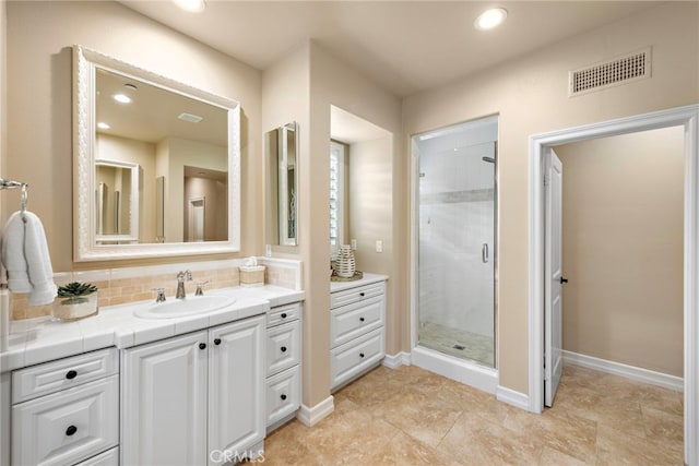 21 Corte Lomas Verdes, San Clemente, CA 92673 - full bath featuring vanity, a stall shower, decorative backsplash, recessed lighting, and baseboards