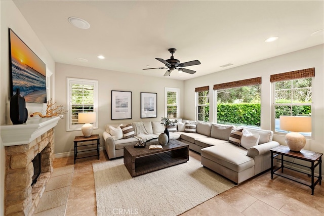 21 Corte Lomas Verdes, San Clemente, CA 92673 - living area with healthy amount of natural light, a ceiling fan, recessed lighting, a stone fireplace, and light tile patterned flooring