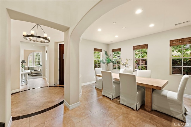 21 Corte Lomas Verdes, San Clemente, CA 92673 - dining area featuring recessed lighting, arched walkways, healthy amount of natural light, baseboards, and a chandelier