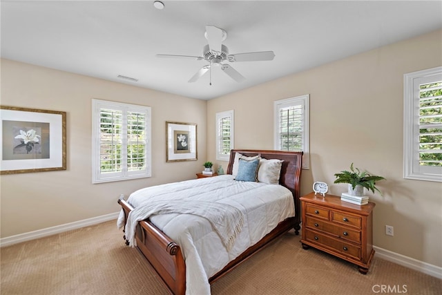 21 Corte Lomas Verdes, San Clemente, CA 92673 - bedroom with light colored carpet, baseboards, and multiple windows
