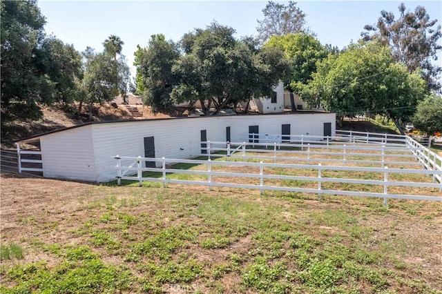 1615 Halsey St, Redlands, CA 92373 - back of house featuring an exterior structure and an outbuilding