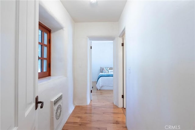 1615 Halsey St, Redlands, CA 92373 - corridor featuring light wood-style floors and heating unit