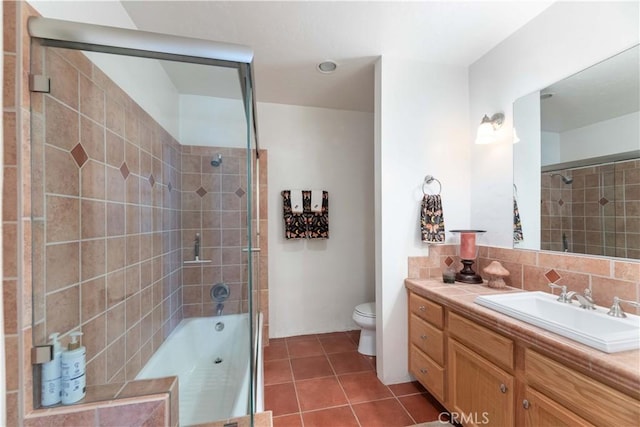 1615 Halsey St, Redlands, CA 92373 - bathroom featuring vanity, tile patterned flooring, tiled shower / bath, and backsplash