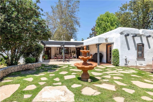 1615 Halsey St, Redlands, CA 92373 - back of house with a patio area and stucco siding