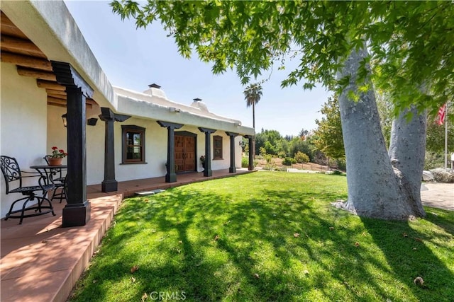 1615 Halsey St, Redlands, CA 92373 - view of green lawn featuring covered porch