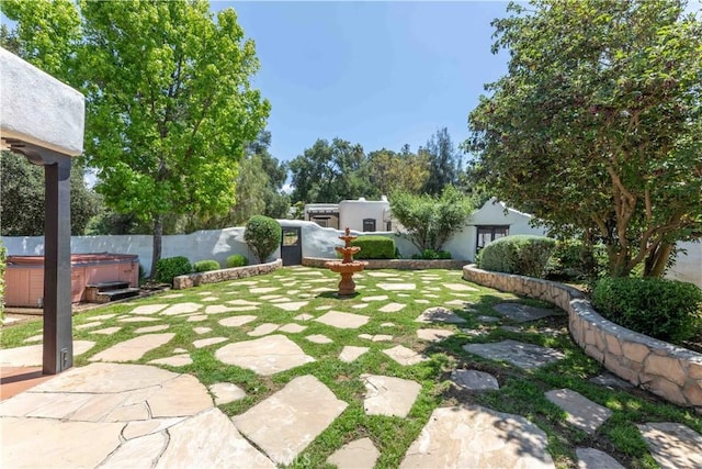 1615 Halsey St, Redlands, CA 92373 - view of yard with a hot tub and a patio area