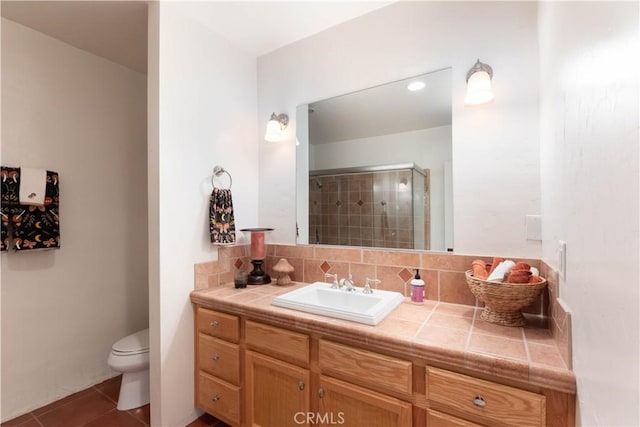 1615 Halsey St, Redlands, CA 92373 - full bathroom with vanity, a shower stall, tile patterned floors, and tasteful backsplash