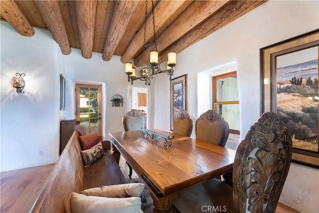 1615 Halsey St, Redlands, CA 92373 - dining space featuring a chandelier and a wood ceiling with exposed beams