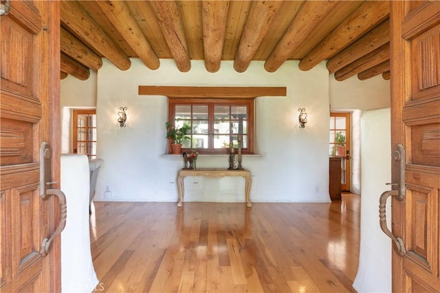 1615 Halsey St, Redlands, CA 92373 - entryway with plenty of natural light, light wood finished floors, and a wood ceiling with exposed beams