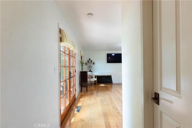 1615 Halsey St, Redlands, CA 92373 - hallway featuring light wood-style flooring and french doors