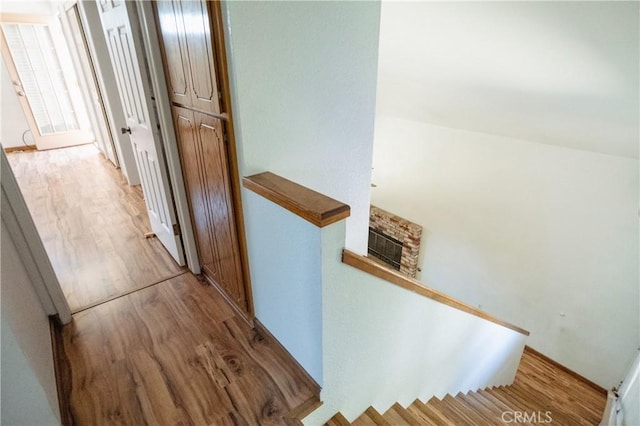 3117 Andre Ln, Turlock, CA 95382 - hall with light wood-style flooring and an upstairs landing